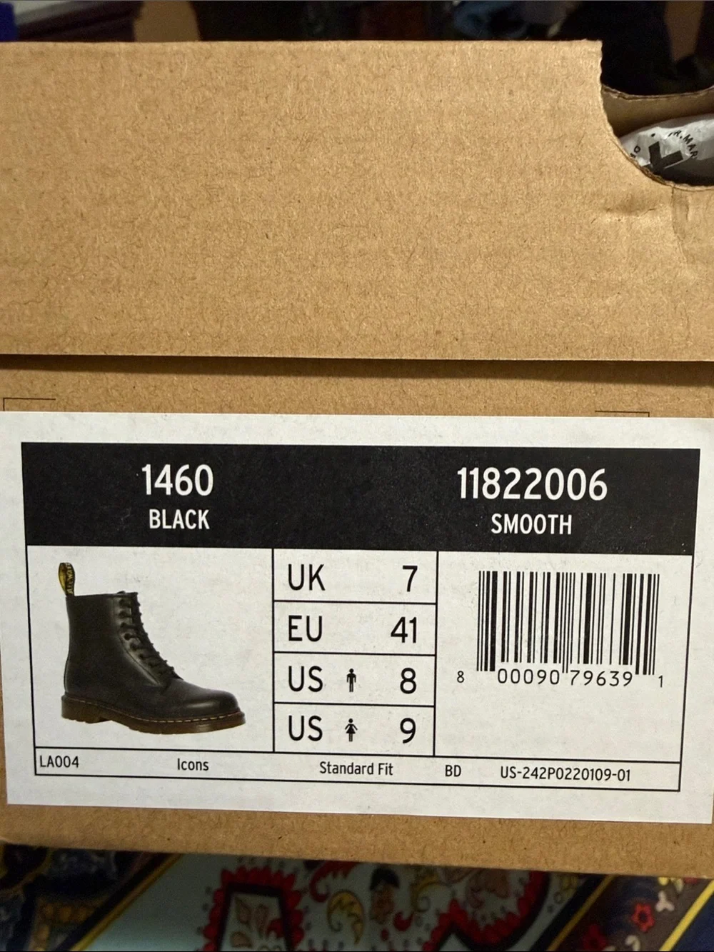 Dr. Martens 1460 Smooth Leather Boots in Black with Yellow Heel Loop